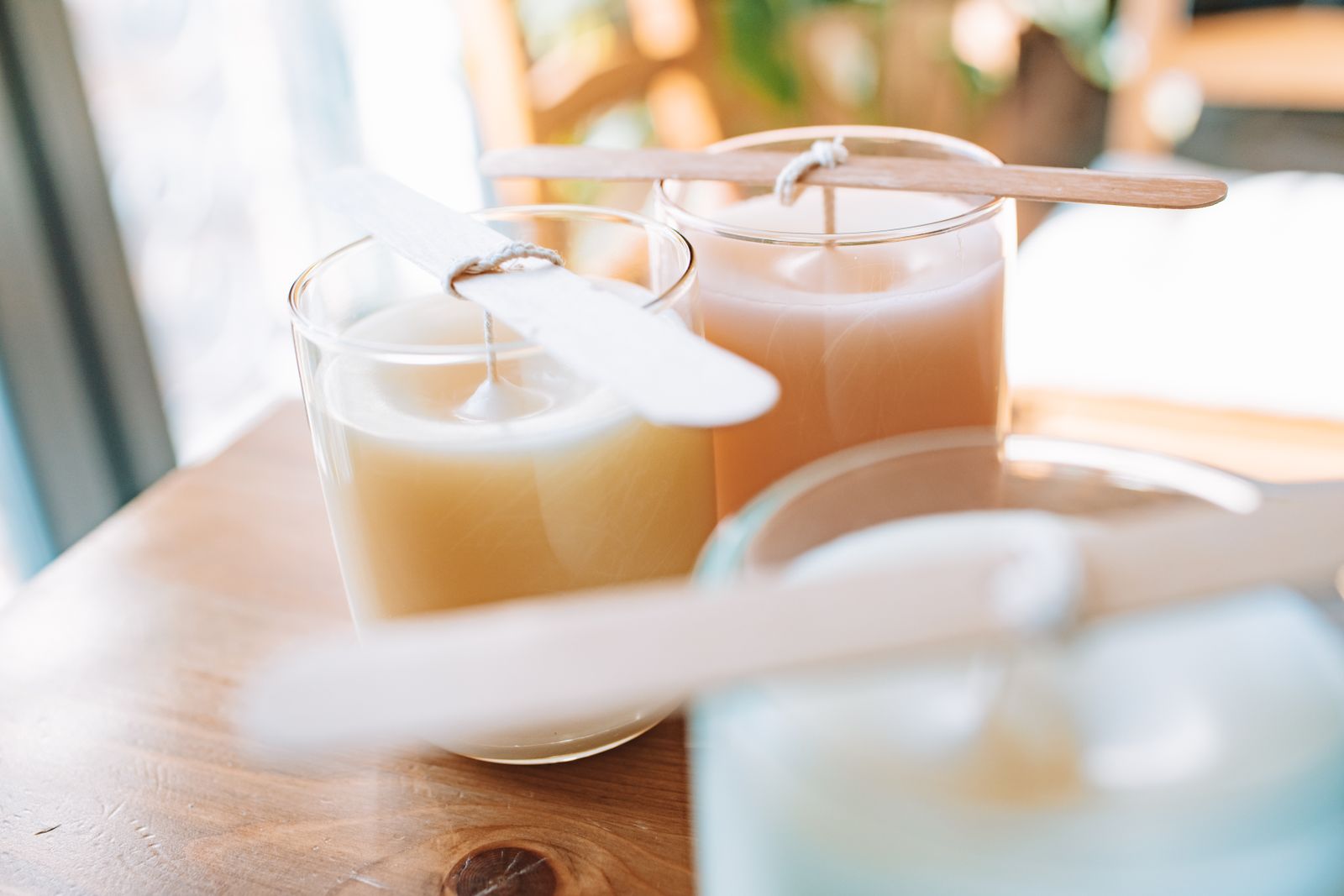 Freshly poured candles setting on the studio table